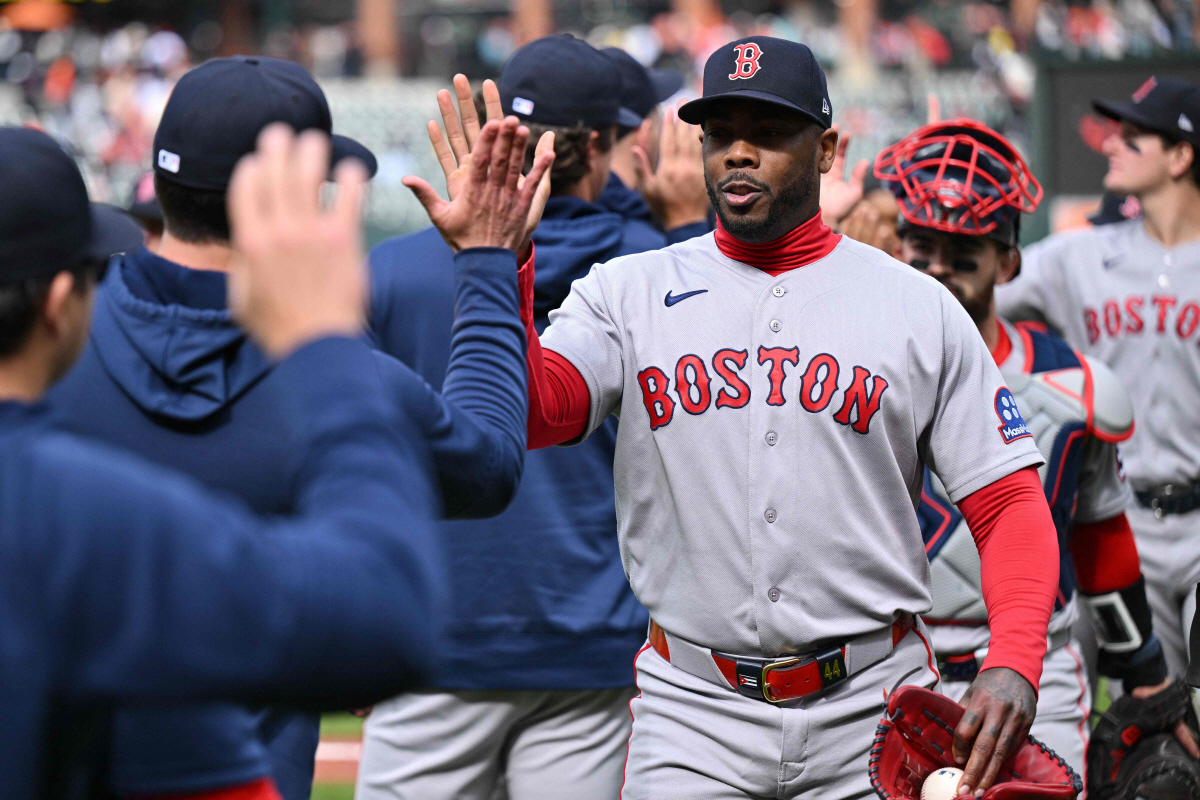 BALTIMORE, MD - APRIL 26: Aroldis Chapman #44 of the Boston Red Sox high fives coaches after the Red Sox defeated the Baltimore Orioles 5-3 at Oriole Park at Camden Yards on April 26, 2026 in Baltimore, Maryland. Jamie Sabau/Getty Images/AFP (Photo by Jamie Sabau / GETTY IMAGES NORTH AMERICA / Getty Images via AFP)
