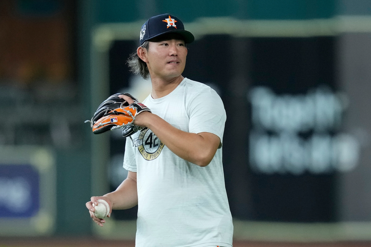 Houston Astros pitcher Tatsuya Imai warms up before a baseball game against the Colorado Rockies, Wednesday, April 15, 2026, in Houston. (AP Photo/Kevin M. Cox)