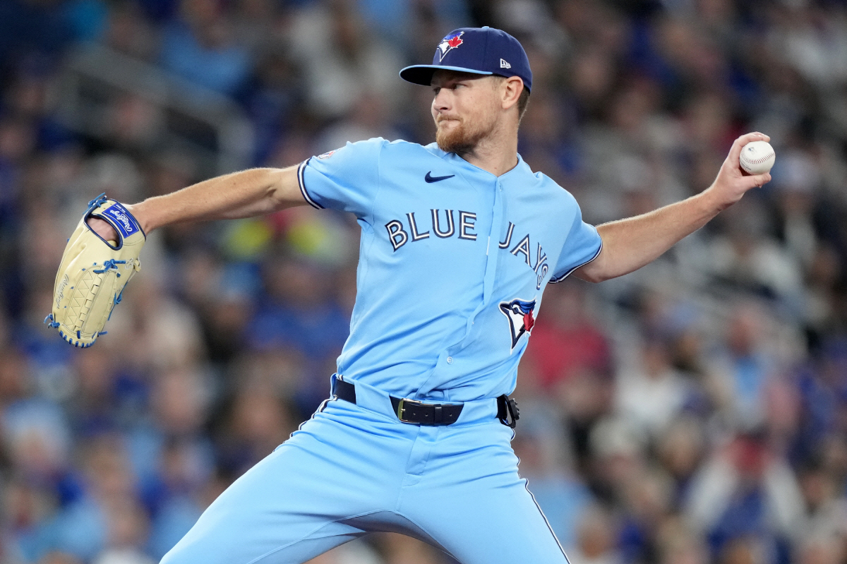 Toronto Blue Jays pitcher Eric Lauer (56) works against the Minnesota Twins during the first inning of a baseball game in Toronto, Saturday, April 11, 2026. (Nathan Denette/The Canadian Press via AP) MANDATORY CREDIT