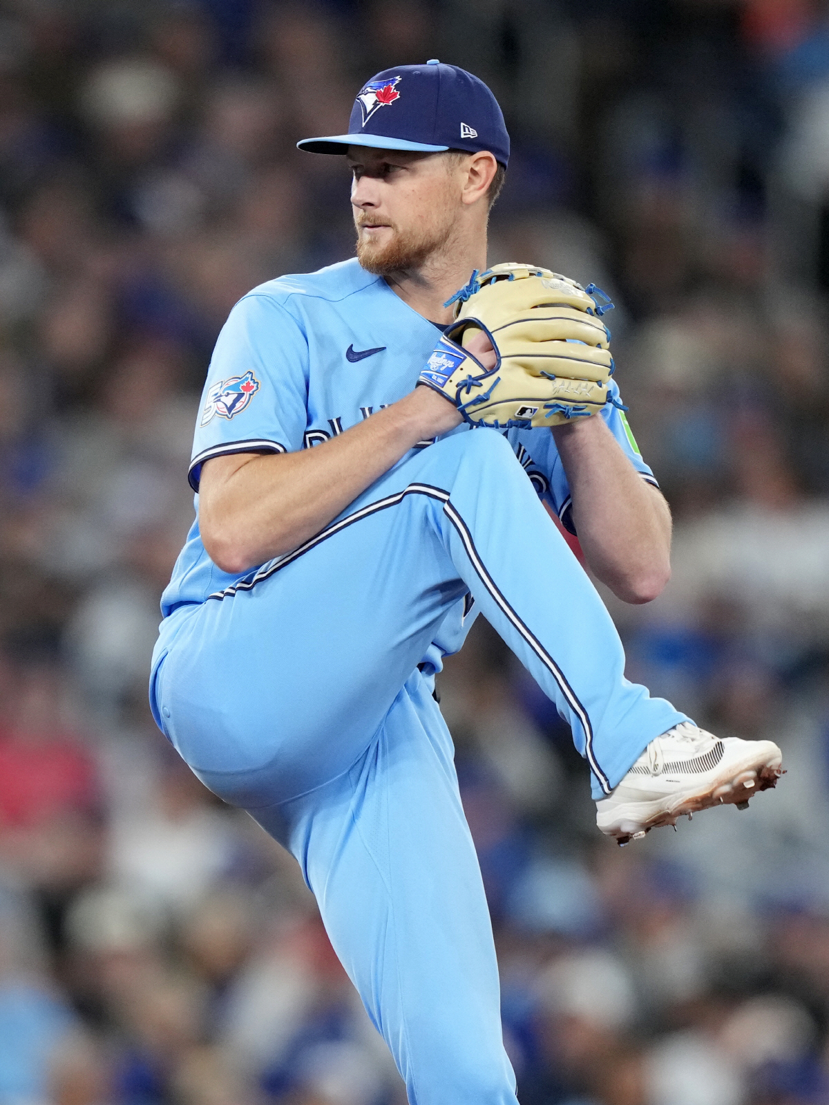 Toronto Blue Jays pitcher Eric Lauer (56) works against the Minnesota Twins during the first inning of a baseball game in Toronto, Saturday, April 11, 2026. (Nathan Denette/The Canadian Press via AP) MANDATORY CREDIT
