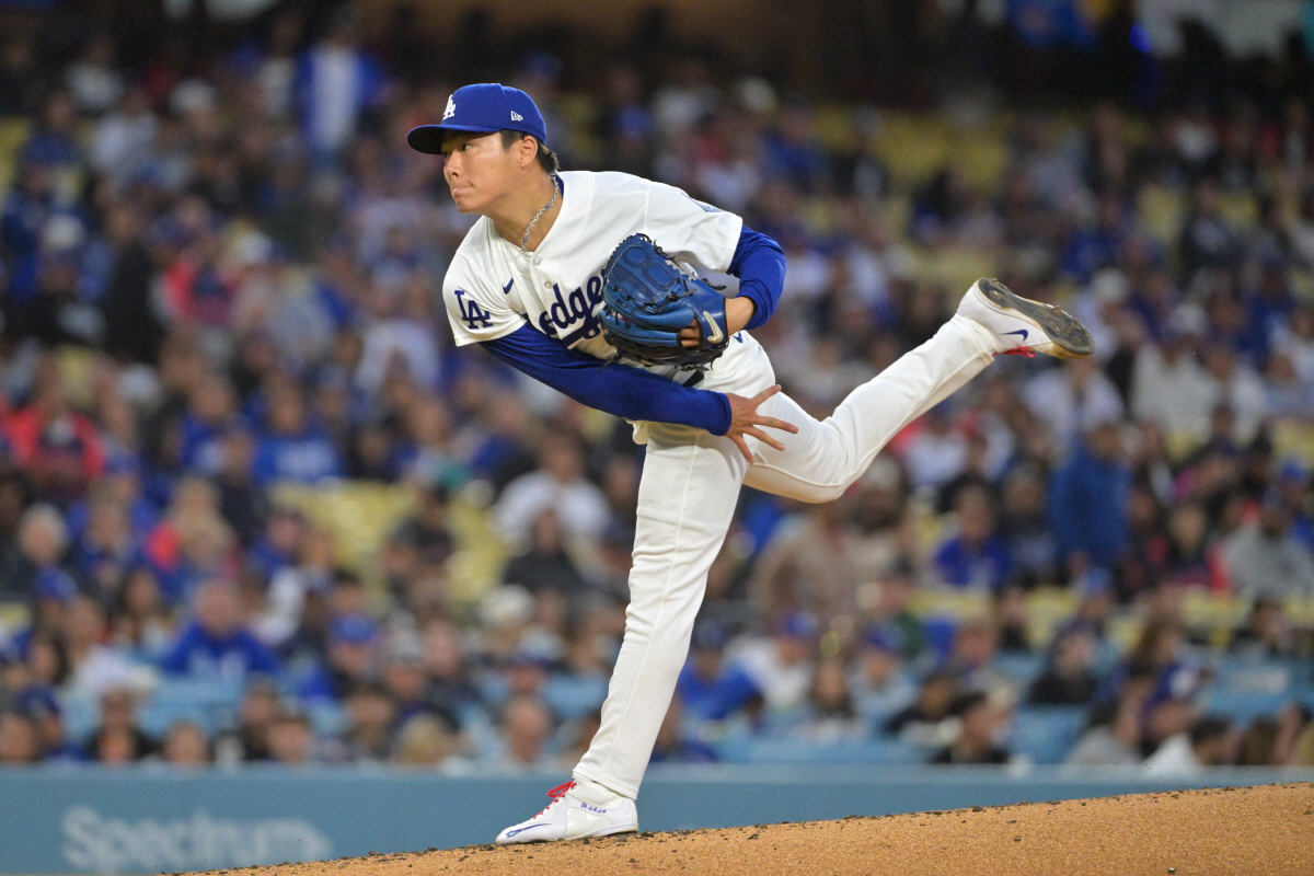 Apr 27, 2026; Los Angeles, California, USA; Los Angeles Dodgers pitcher Yoshinobu Yamamoto (18) pitches against the Miami Marlins in the second inning at Dodger Stadium. Mandatory Credit: Jayne Kamin-Oncea-Imagn Images
