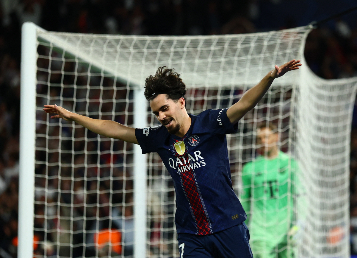 Soccer Football - UEFA Champions League - Semi Final - First Leg - Paris St Germain v Bayern Munich - Parc des Princes, Paris, France - April 28, 2026 Paris St Germain's Vitinha celebrates after Ousmane Dembele scores their fifth goal REUTERS/Sarah Meyssonnier