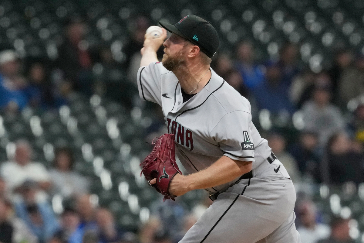 Arizona Diamondbacks starting pitcher Merrill Kelly throws against the Milwaukee Brewers during the first inning of a baseball game Tuesday, April 28, 2026, in Milwaukee. (AP Photo/Nam Y. Huh)