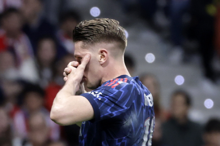 epa12922565 Viktor Gyokeres of Arsenal celebrates scoring the 0-1 goal during the UEFA Champions League semi finals first leg soccer match between Atletico Madrid and Arsenal in Madrid, Spain, 29 April 2026. EPA/JUANJO MARTIN