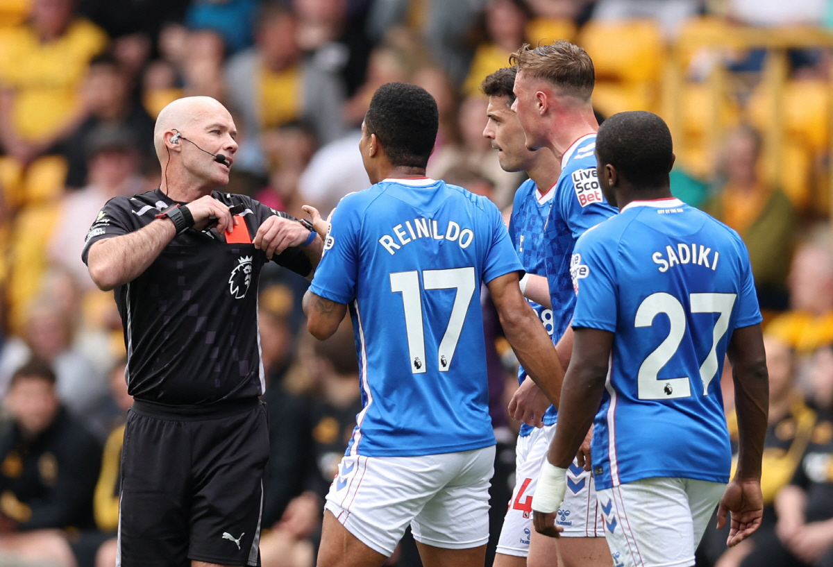 Soccer Football - Premier League - Wolverhampton Wanderers v Sunderland - Molineux Stadium, Wolverhampton, Britain - May 2, 2026 Sunderland's Daniel Ballard is shown a red card by referee Paul Tierney REUTERS