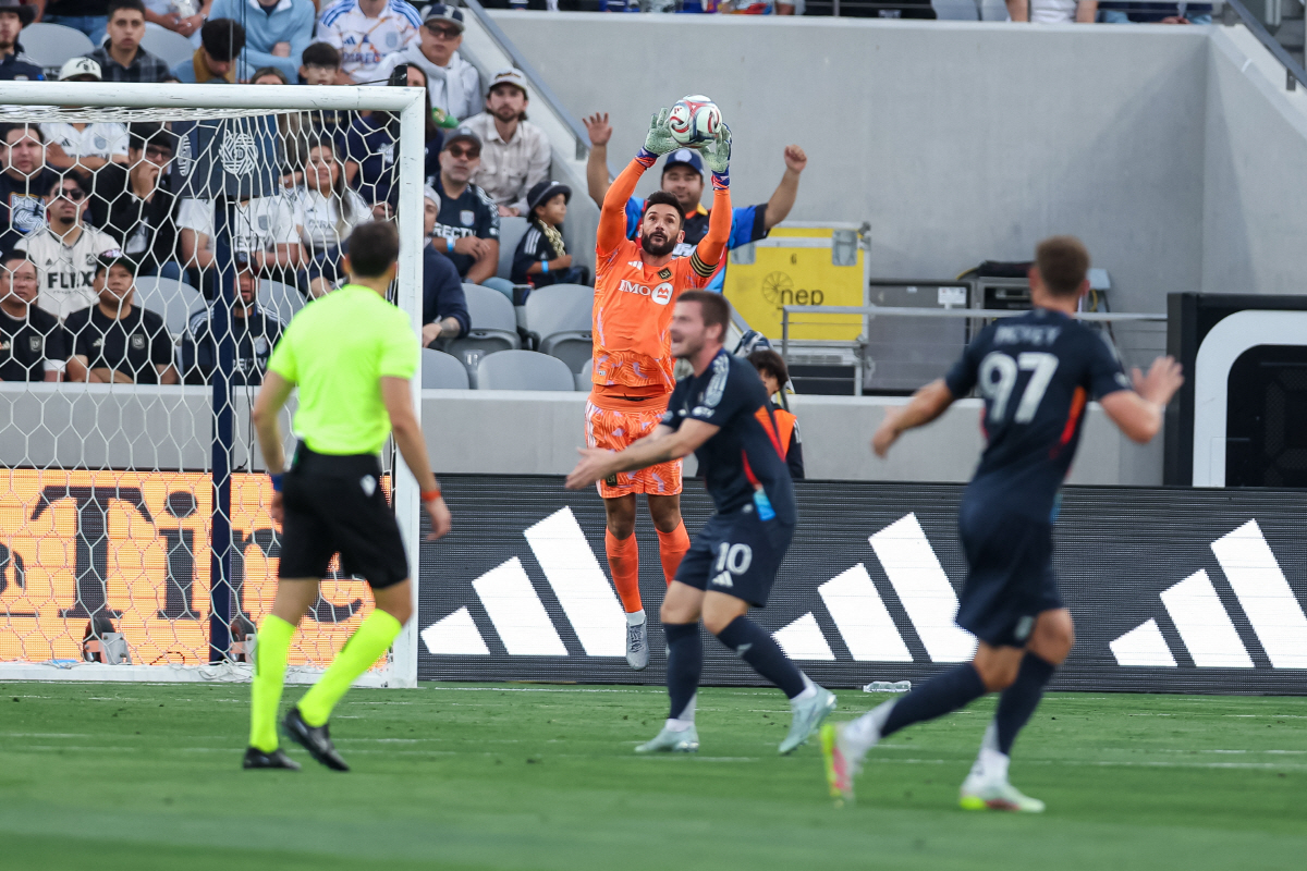 May 2, 2026; San Diego, California, USA; Los Angeles Football Club goalkeeper Hugo Lloris (1) makes a stop during the first half against San Diego FC at Snapdragon Stadium. Mandatory Credit: Chadd Cady-Imagn Images