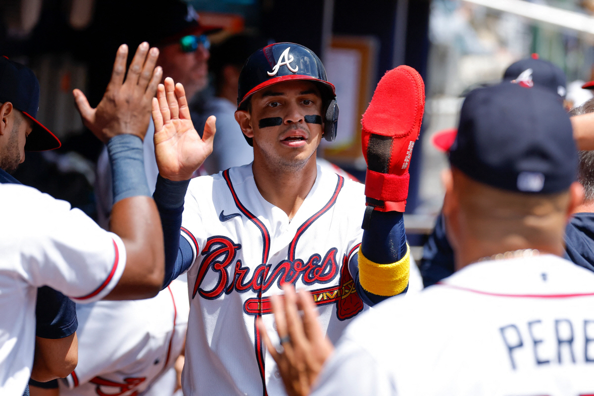 ATLANTA, GEORGIA - APRIL 30: Mauricio Dubon #14 of the Atlanta Braves reacts after scoring during the second inning against the Detroit Tigers at Truist Park on April 30, 2026 in Atlanta, Georgia. Todd Kirkland/Getty Images/AFP (Photo by Todd Kirkland / GETTY IMAGES NORTH AMERICA / Getty Images via AFP)