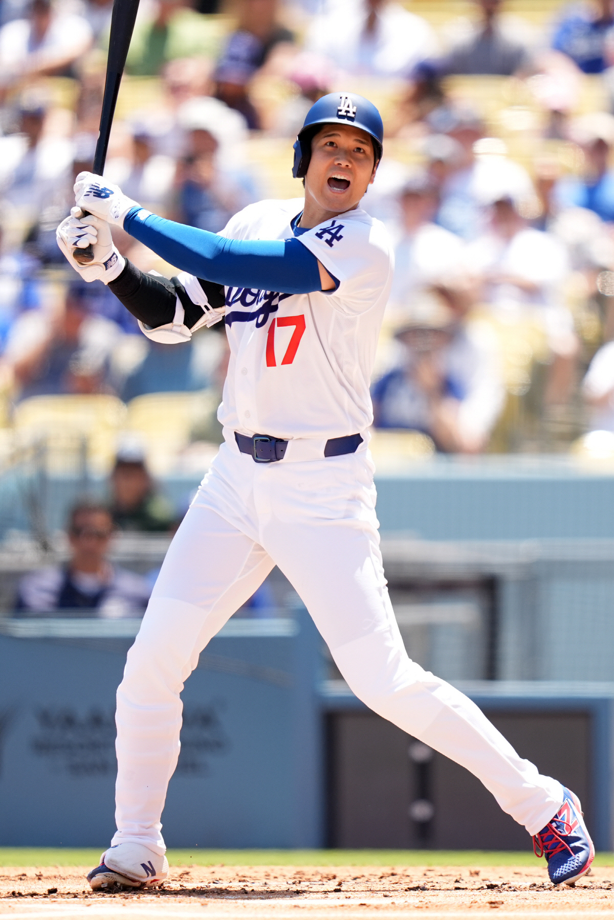 Los Angeles Dodgers' Shohei Ohtani (17) reacts to a foul ball against the Miami Marlins in the first inning of a baseball game Wednesday, April 29, 2026, in Los Angeles. (AP Photo/Scott Strazzante)