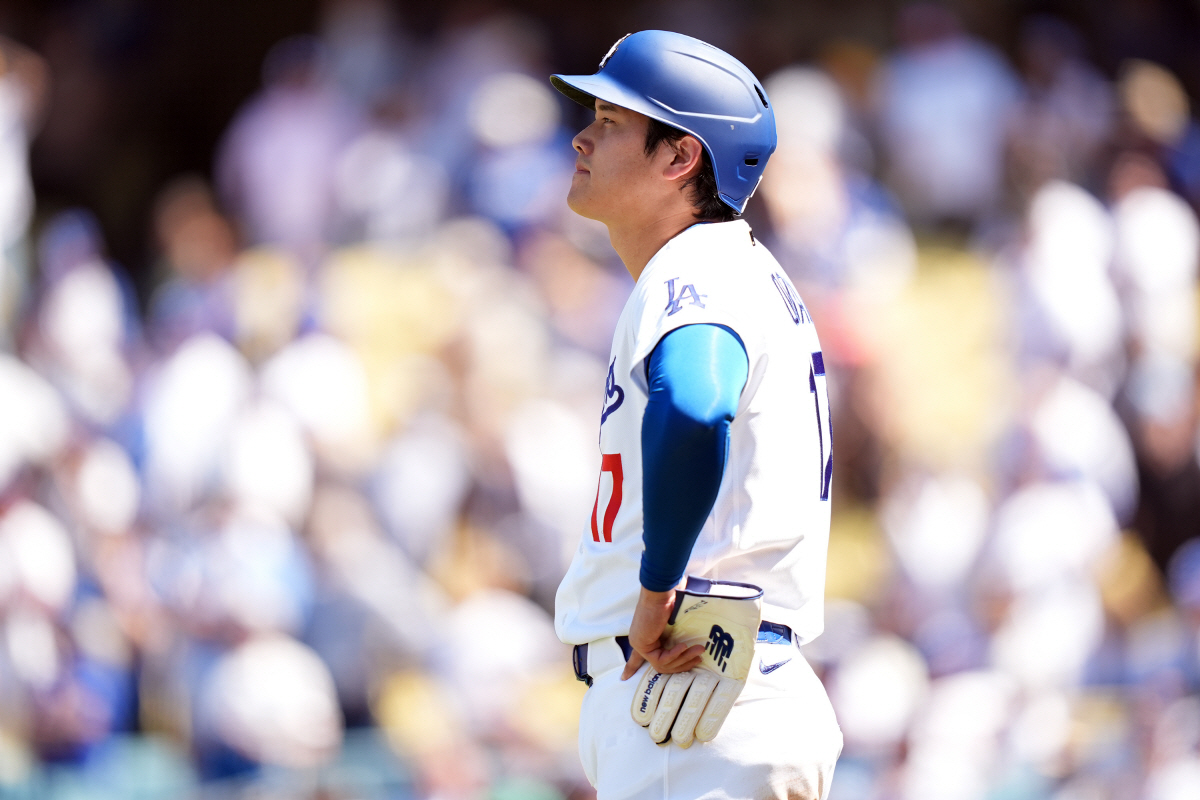 Los Angeles Dodgers' Shohei Ohtani watches a replay of a game-ending double play by Miami Marlins in the ninth inning of a baseball game Wednesday, April 29, 2026, in Los Angeles. (AP Photo/Scott Strazzante)