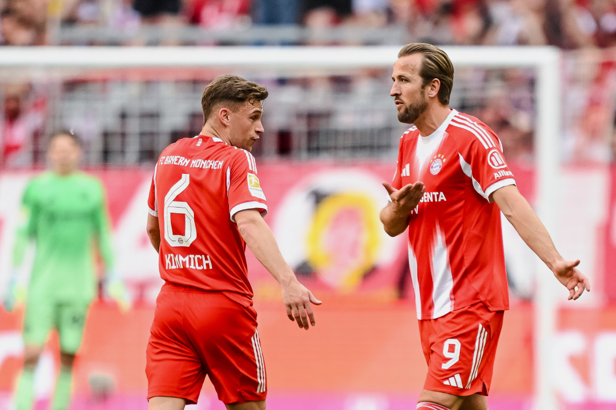 Bayern's Joshua Kimmich, left, and Harry Kane react during a German Bundesliga soccer match between Bayern Munich and 1. FC Heidenheim in Munich, Germany, Saturday, May 2, 2026. (Harry Langer/dpa via AP) THE DEUTSCHE FUSSBALL LIGA DFL DOES NOT ALLOW ITS IMAGES TO BE USED AS SEQUENCES TO EMULATE VIDEO; GERMANY OUT; MANDATORY CREDIT