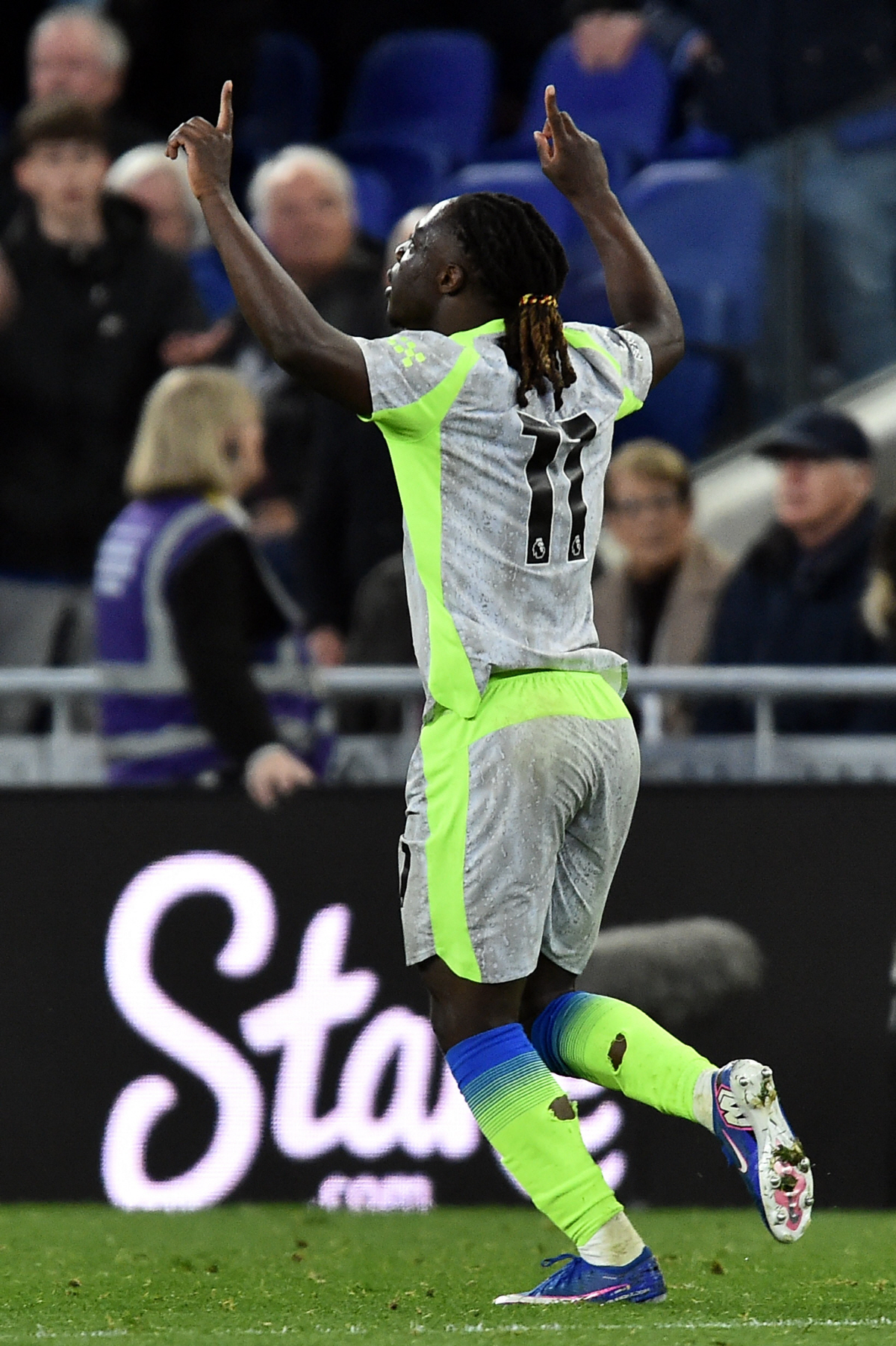 Manchester City's Belgian midfielder #11 Jeremy Doku celebrates scoring the equalizer during the English Premier League football match between Everton and Manchester City at Hill Dickinson Stadium in Liverpool on May 4, 2026. (Photo by PETER POWELL / AFP)