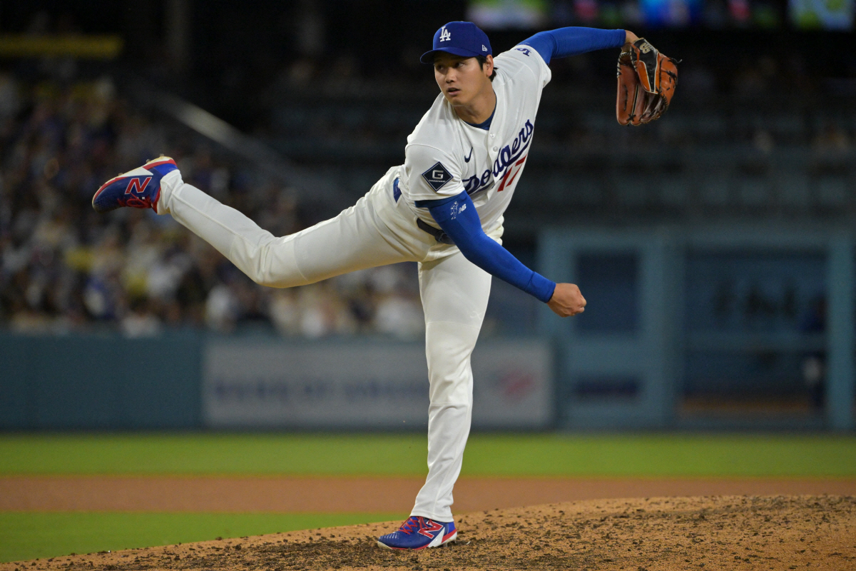 Apr 28, 2026; Los Angeles, California, USA; Los Angeles Dodgers starting pitcher Shohei Ohtani (17) delivers to the plate in the fifth inning against the Miami Marlins at Dodger Stadium. Mandatory Credit: Jayne Kamin-Oncea-Imagn Images