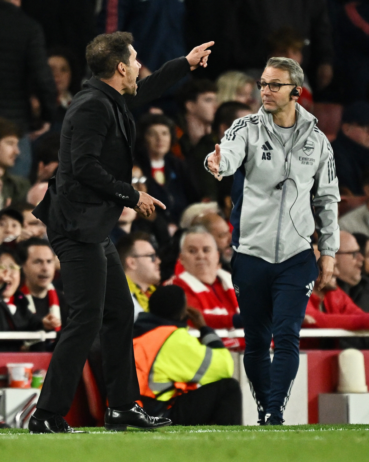 Soccer Football - UEFA Champions League - Semi Final - Second Leg - Arsenal v Atletico Madrid - Emirates Stadium, London, Britain - May 5, 2026 Atletico Madrid coach Diego Simeone and Arsenal assistant manager Albert Stuivenberg REUTERS/Dylan Martinez