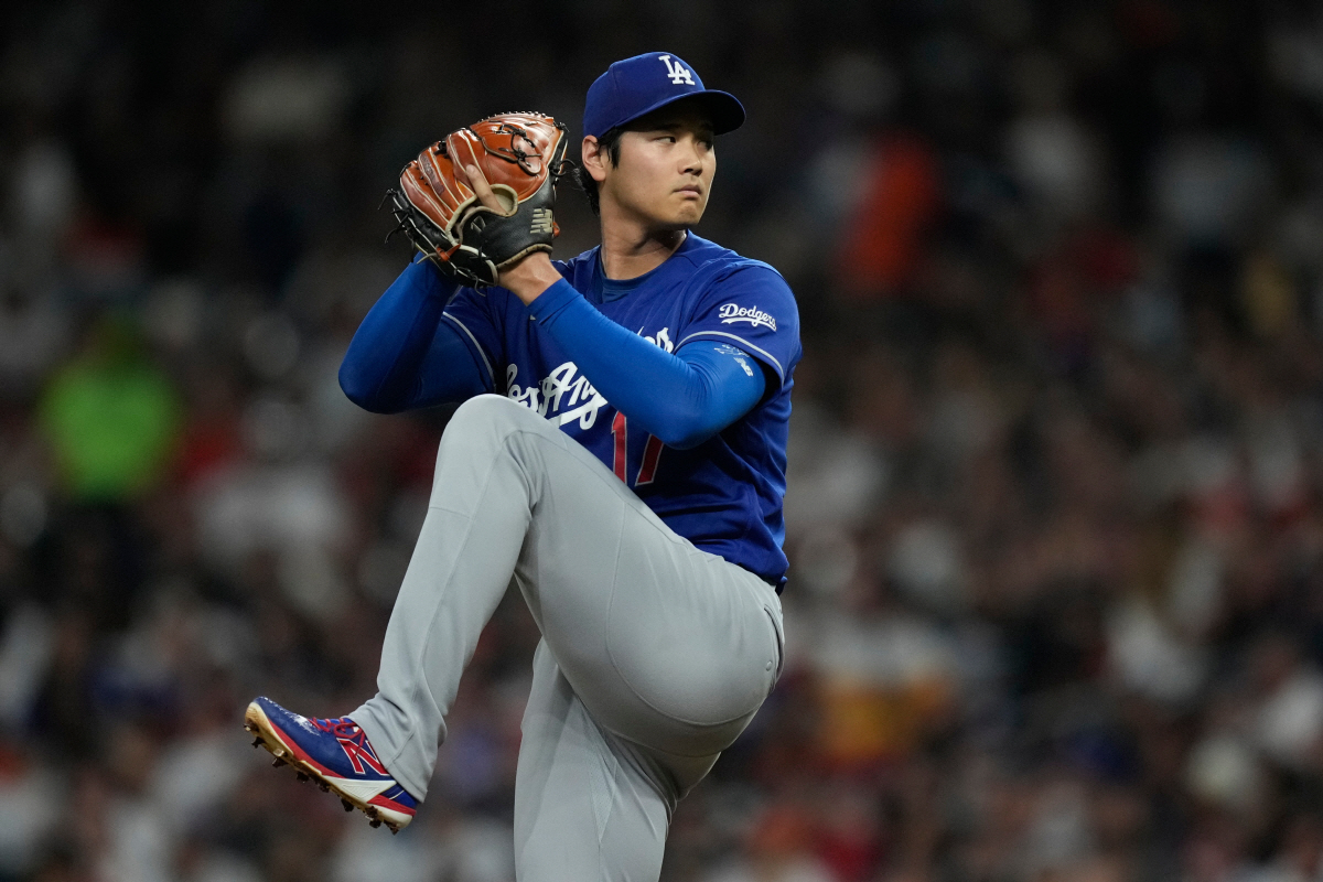 Los Angeles Dodgers starting pitcher Shohei Ohtani throws during the second inning of a baseball game against the Houston Astros in Houston, Tuesday, May 5, 2026. (AP Photo/Ashley Landis)