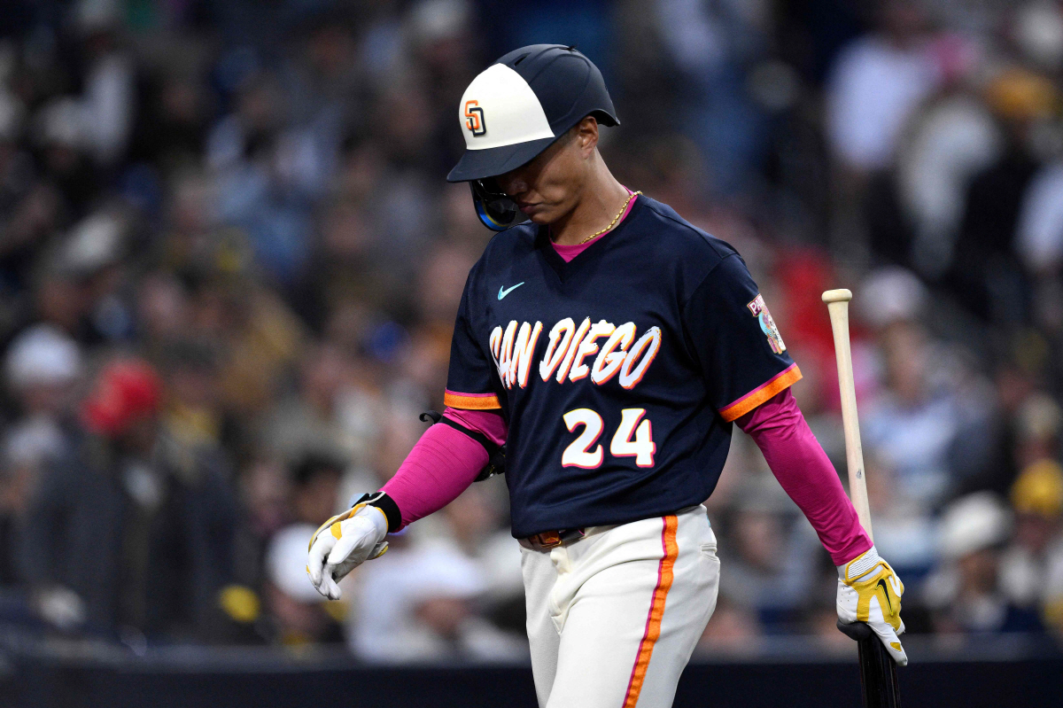SAN DIEGO, CALIFORNIA - MAY 08: Sung-Mun Song #24 of the San Diego Padres walks to the dugout after striking out during the third inning against the St. Louis Cardinals at Petco Park on May 08, 2026 in San Diego, California. Orlando Ramirez/Getty Images/AFP (Photo by Orlando Ramirez / GETTY IMAGES NORTH AMERICA / Getty Images via AFP)