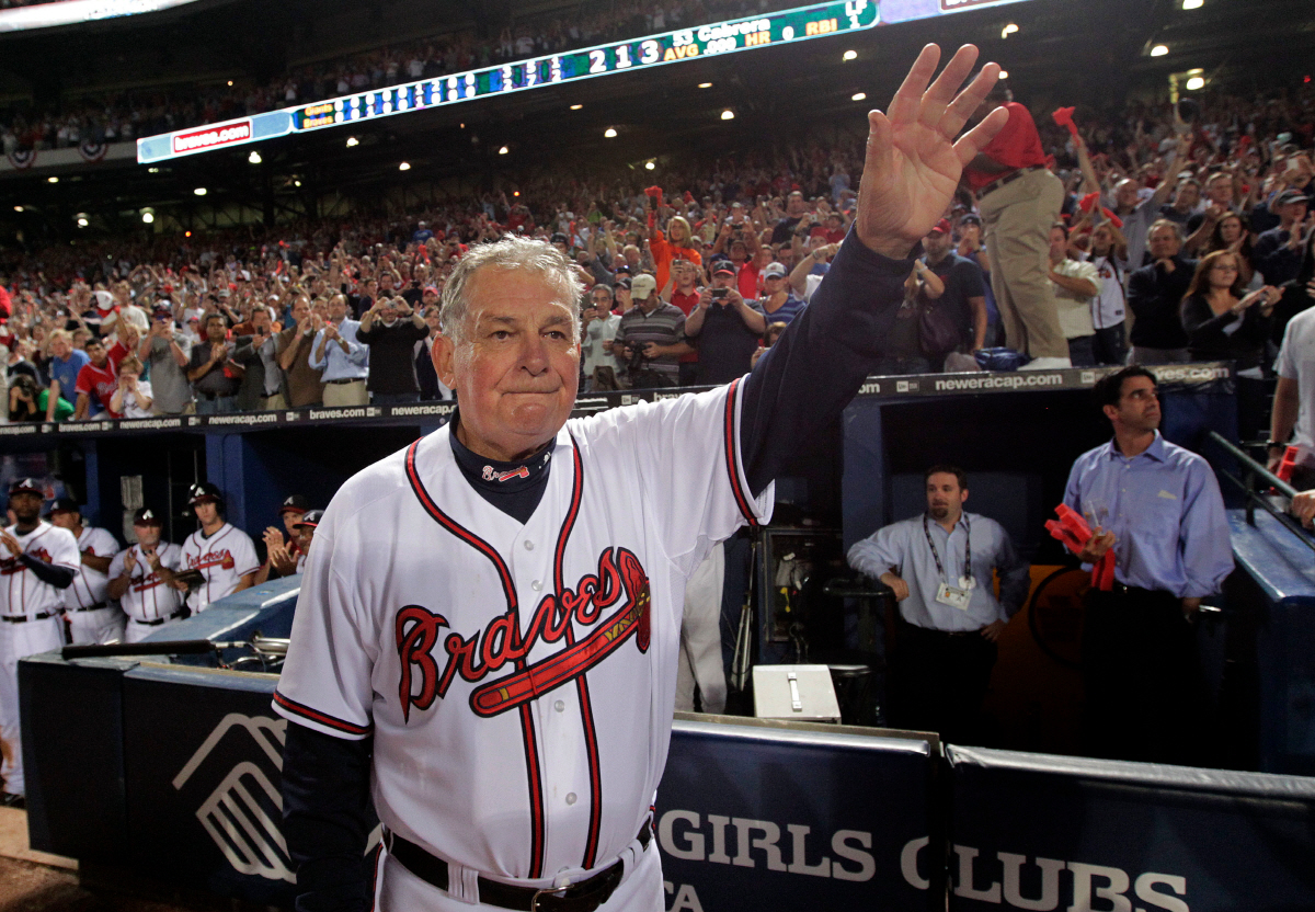 FILE - Atlanta Braves manager Bobby Cox waves to fans after a loss to the San Francisco Giants in Game 4 of baseball's National League Division Series in Atlanta, Oct. 11, 2010. (AP Photo/Dave Martin, File) FILE PHOTO