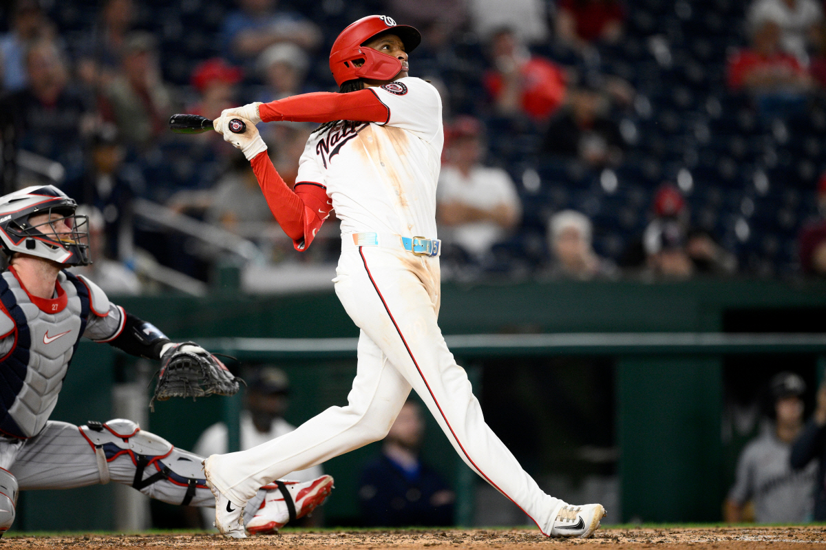 Washington Nationals' CJ Abrams follows through on his grand slam during the eighth inning of a baseball game against the Minnesota Twins, Wednesday, May 6, 2026, in Washington. (AP Photo/Nick Wass)