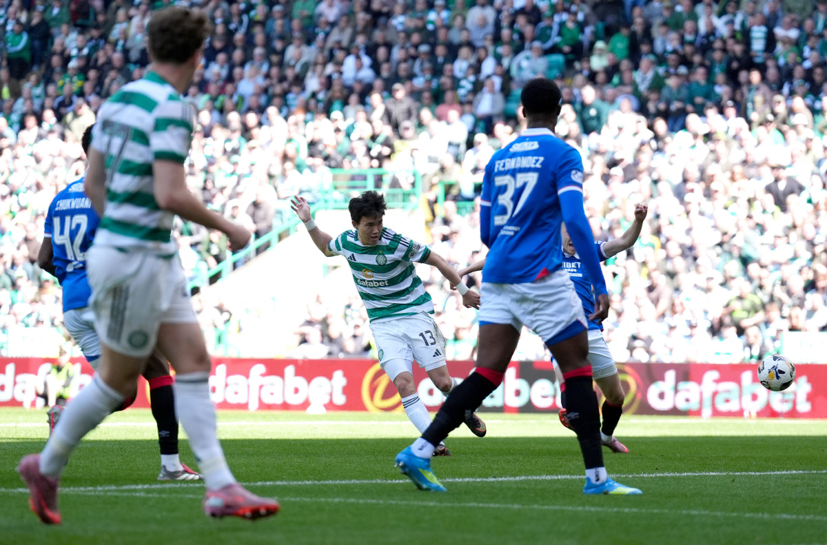 Celtic's Yang Hyun-Jun scores their side's first goal during the Scottish Premiership soccer match between Celtic and Rangers, in Glasgow, Sunday May 10, 2026. (Andrew Milligan/PA via AP) UNITED KINGDOM OUT; NO SALES; NO ARCHIVE; PHOTOGRAPH MAY NOT BE STORED OR USED FOR MORE THAN 14 DAYS AFTER THE DAY OF TRANSMISSION; MANDATORY CREDIT