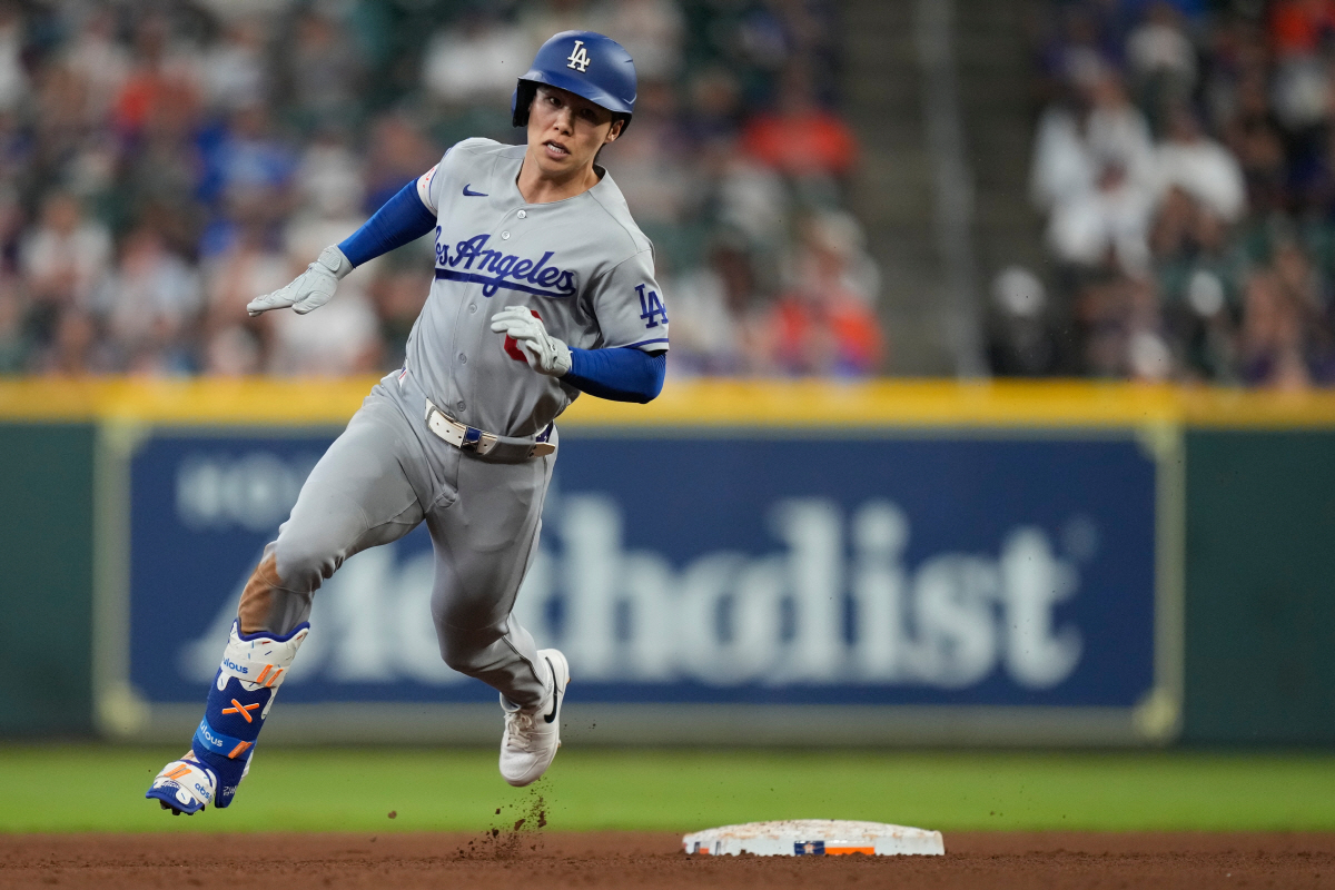 Los Angeles Dodgers' Hyeseong Kim rounds second on a triple during the seventh inning of a baseball game against the Houston Astros in Houston, Wednesday, May 6, 2026. (AP Photo/Ashley Landis)