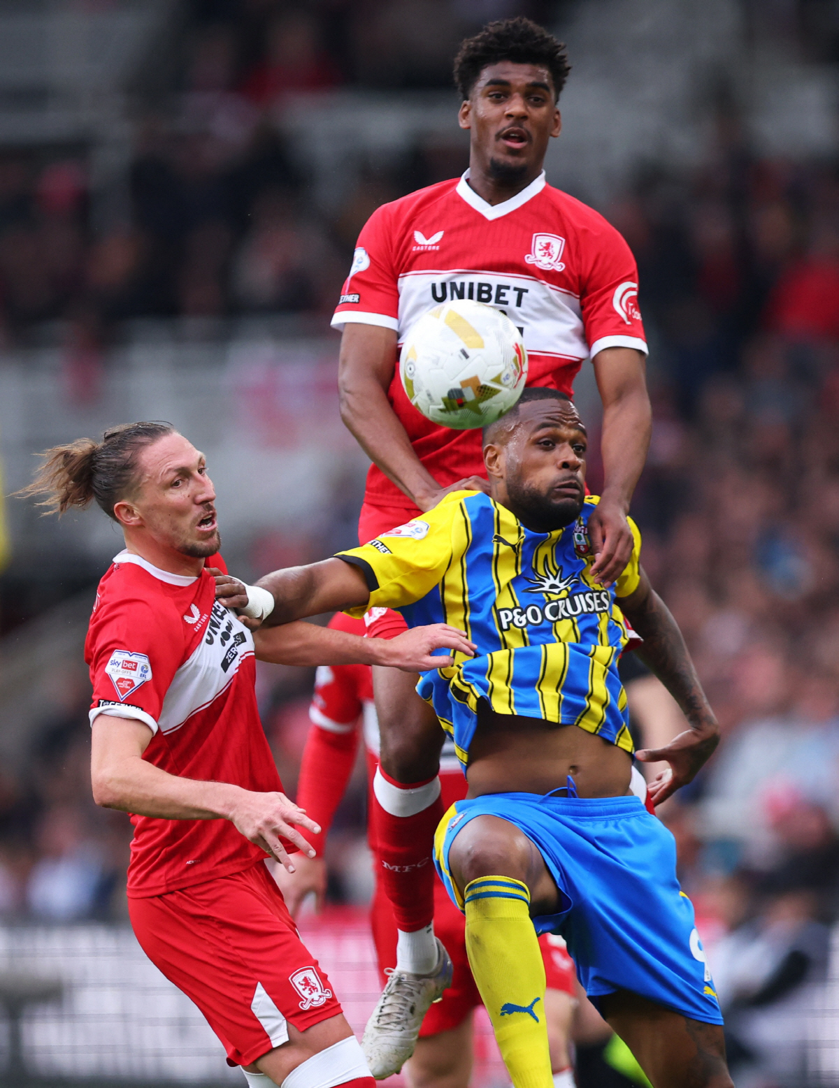 Soccer Football - Championship - Championship - Play Offs - Semi-finals - First Leg - Middlesbrough v Southampton - Riverside Stadium, Middlesbrough, Britain - May 9, 2026 Southampton's Cyle Larin in action with Middlesbrough's Luke Ayling and Adilson Malanda Action Images/Craig Brough EDITORIAL USE ONLY. NO USE WITH UNAUTHORIZED AUDIO, VIDEO, DATA, FIXTURE LISTS, CLUB/LEAGUE LOGOS OR 'LIVE' SERVICES. ONLINE IN-MATCH USE LIMITED TO 120 IMAGES, NO VIDEO EMULATION. NO USE IN BETTING, GAMES OR SINGLE CLUB/LEAGUE/PLAYER PUBLICATIONS. PLEASE CONTACT YOUR ACCOUNT REPRESENTATIVE FOR FURTHER DETAILS..