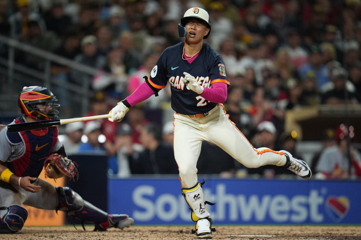 San Diego Padres' Sung-Mun Song reacts as he strikes out during the fifth inning of a baseball game against the St. Louis Cardinals Friday, May 8, 2026, in San Diego. (AP Photo/Gregory Bull)