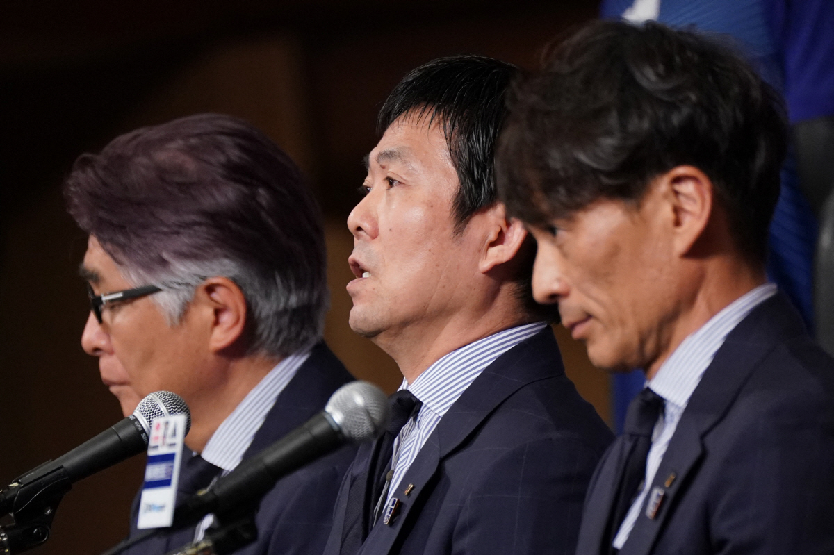 Japan's national football team head coach Hajime Moriyasu (C) announces the members of Japan's 2026 World Cup squad during a press conference at a hotel in Tokyo on May 15, 2026. (Photo by Kazuhiro NOGI / AFP)