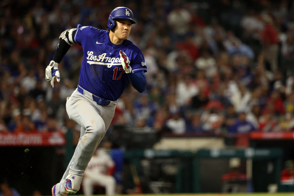 May 16, 2026; Anaheim, California, USA; Los Angeles Dodgers two-way player Shohei Ohtani (17) runs around bases on an RBI triple during the eighth inning against the Los Angeles Angels at Angel Stadium. Mandatory Credit: Kiyoshi Mio-Imagn Images