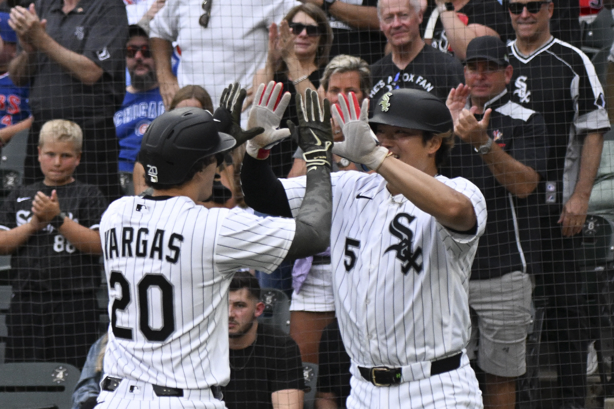 May 16, 2026; Chicago, Illinois, USA; Chicago White Sox third baseman Miguel Vargas (20) high fives first baseman Munetaka Murakami (5) after they score on Vargas?s three-run home during the first inning against the Chicago Cubs at Rate Field. Mandatory Credit: Matt Marton-Imagn Images