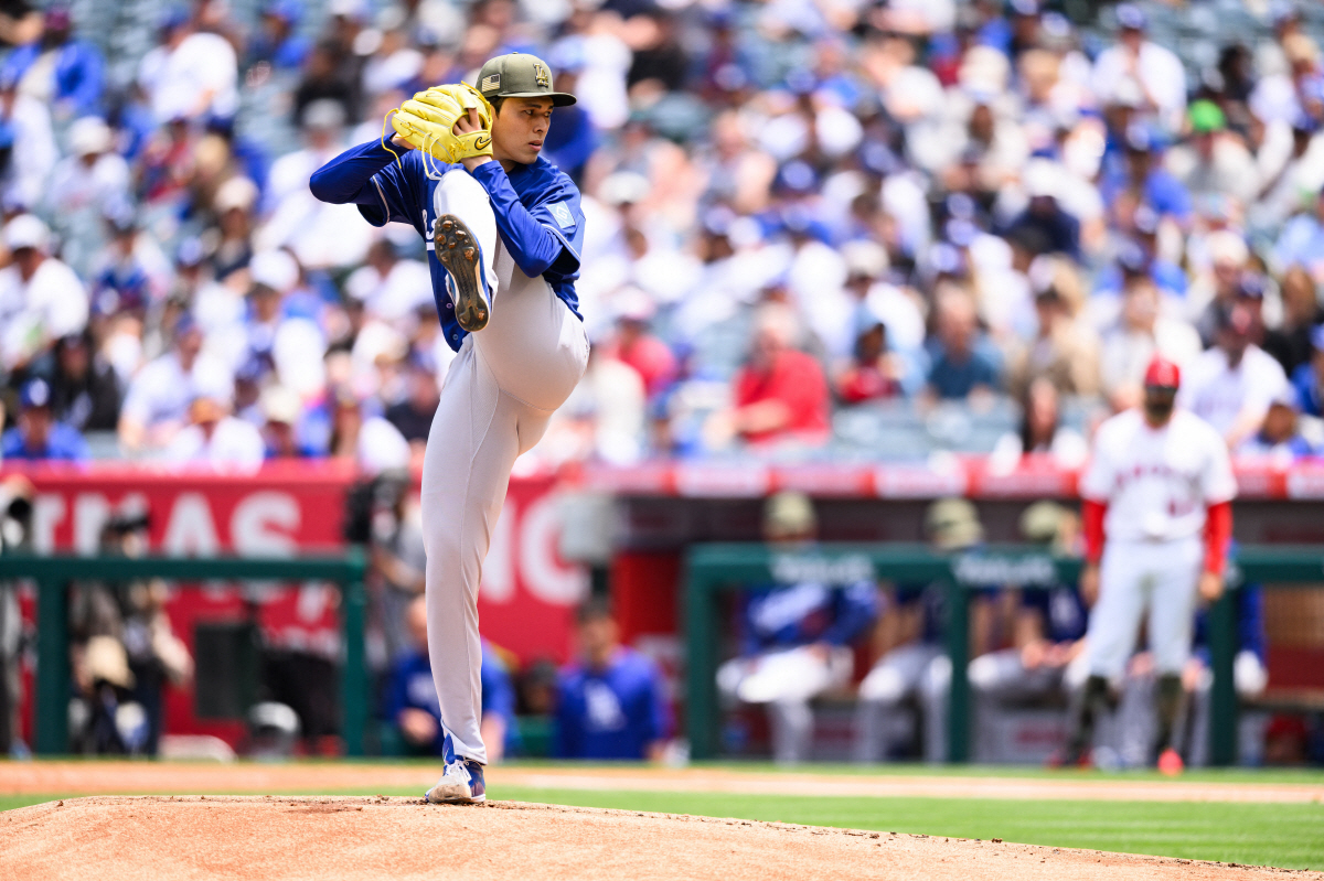May 17, 2026; Anaheim, California, USA; Los Angeles Dodgers pitcher Roki Sasaki (11) delivers during the first inning against the Los Angeles Angels at Angel Stadium. Mandatory Credit: William Liang-Imagn Images