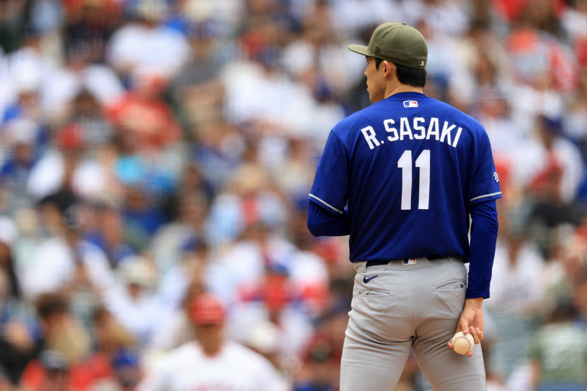 ANAHEIM, CALIFORNIA - MAY 17: Roki Sasaki #11 of the Los Angeles Dodgers pitches during the fourth inning of a game against the Los Angeles Angels at Angel Stadium of Anaheim on May 17, 2026 in Anaheim, California. Sean M. Haffey/Getty Images/AFP (Photo by Sean M. Haffey / GETTY IMAGES NORTH AMERICA / Getty Images via AFP)