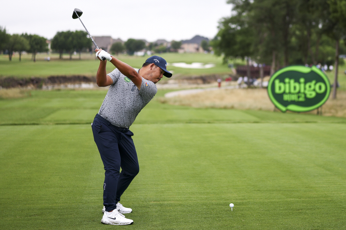 MCKINNEY, TEXAS - MAY 21: Si Woo Kim of South Korea hits a tee shot on the 13th hole during the first round of THE CJ CUP Byron Nelson 2026 at TPC Craig Ranch on May 21, 2026 in McKinney, Texas. (Photo by Mike Mulholland/Getty Images for The CJ Cup)