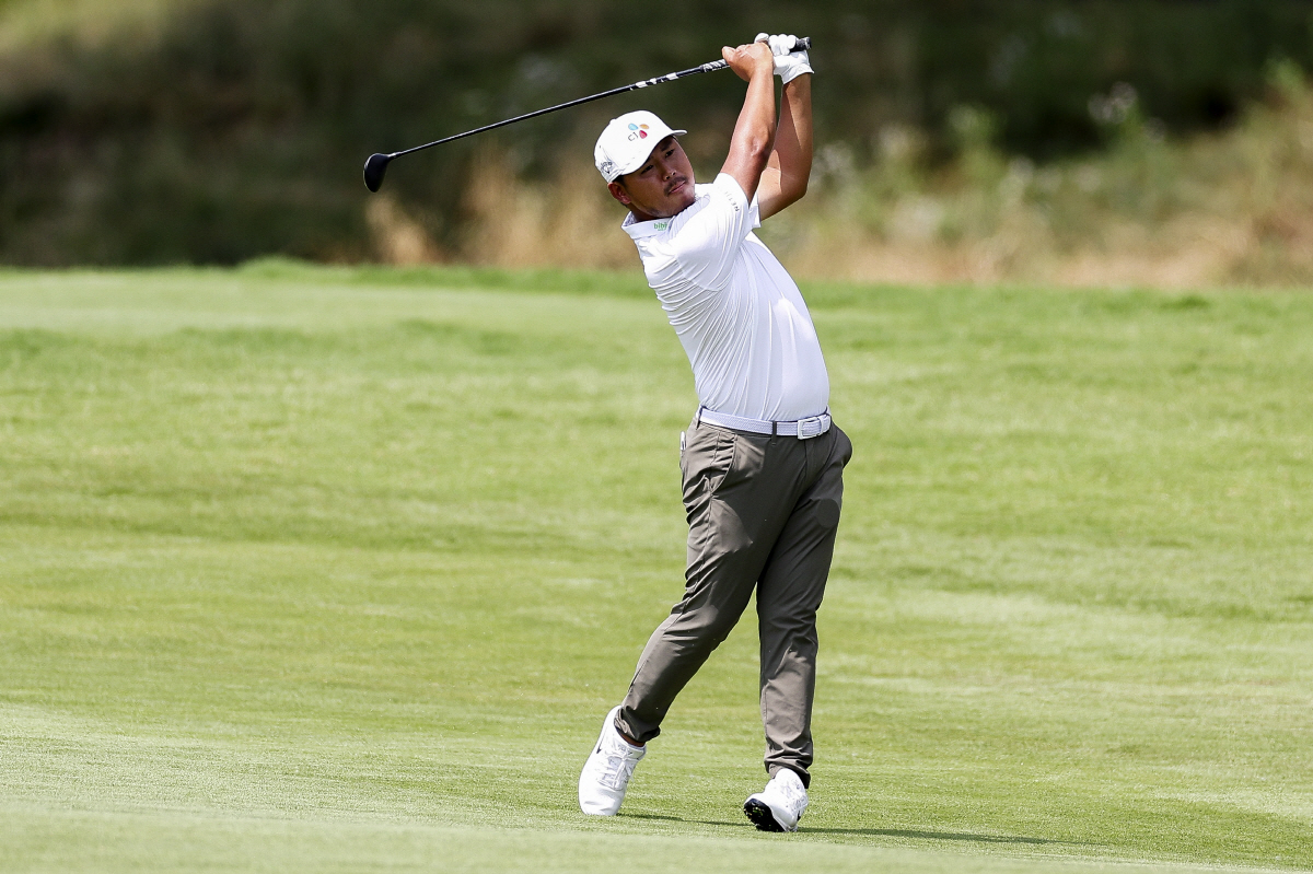 MCKINNEY, TEXAS - MAY 22: Si Woo Kim of South Korea hits an approach shot on the ninth hole during the second round of THE CJ CUP Byron Nelson 2026 at TPC Craig Ranch on May 22, 2026 in McKinney, Texas. (Photo by Mike Mulholland/Getty Images for The CJ Cup)