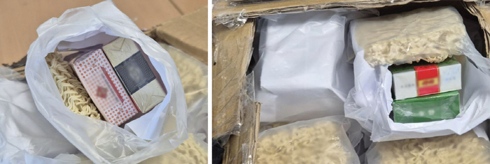 라면 안에 웬 담배…봉지 뜯었더니 9300여 개비 쏟아져