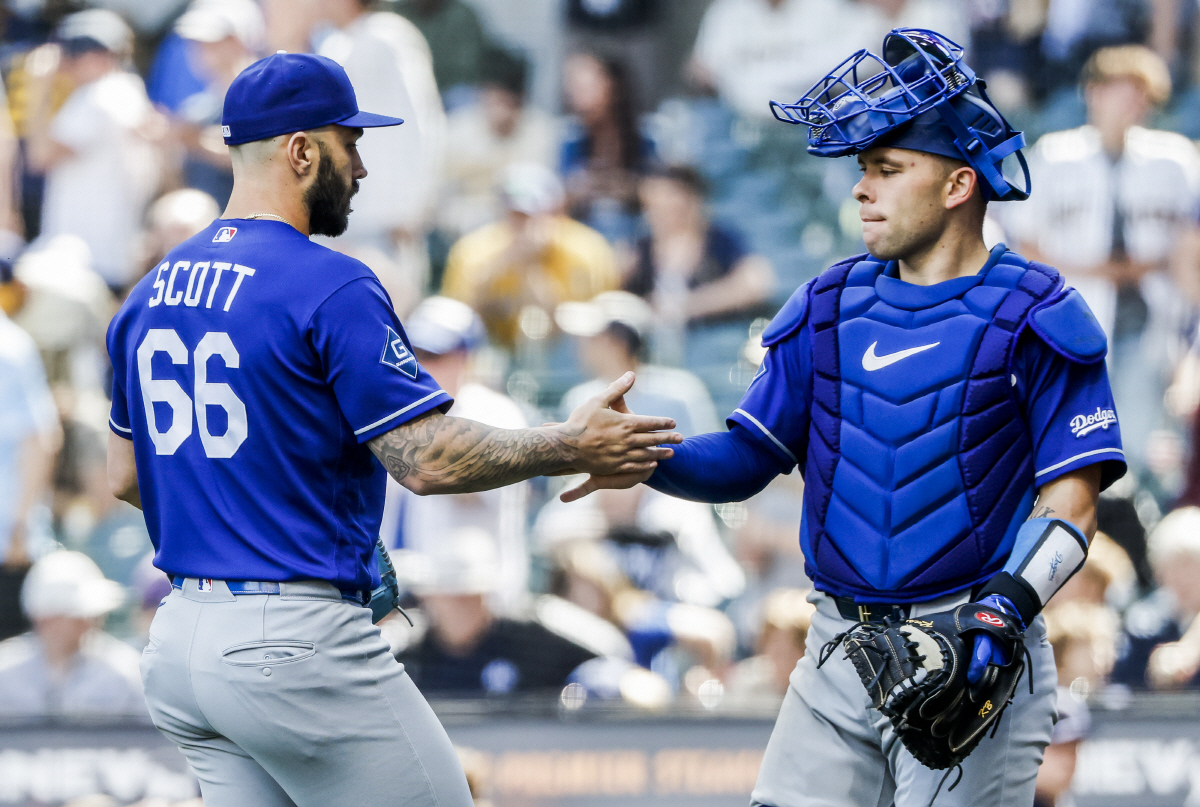 Los Angeles Dodgers closing pitcher Tanner Scott (L) and Los Angeles Dodgers catcher Dalton Rushing (R) celebrate after the final out in the ninth inning of the MLB game between the Los Angeles Dodgers and the Milwaukee Brewers at American Family Field in Milwaukee, Wisconsin on Sunday, May 24, 2026. The Dodgers defeated the Brewers 5-1. Photo by Tannen Maury/UPI
