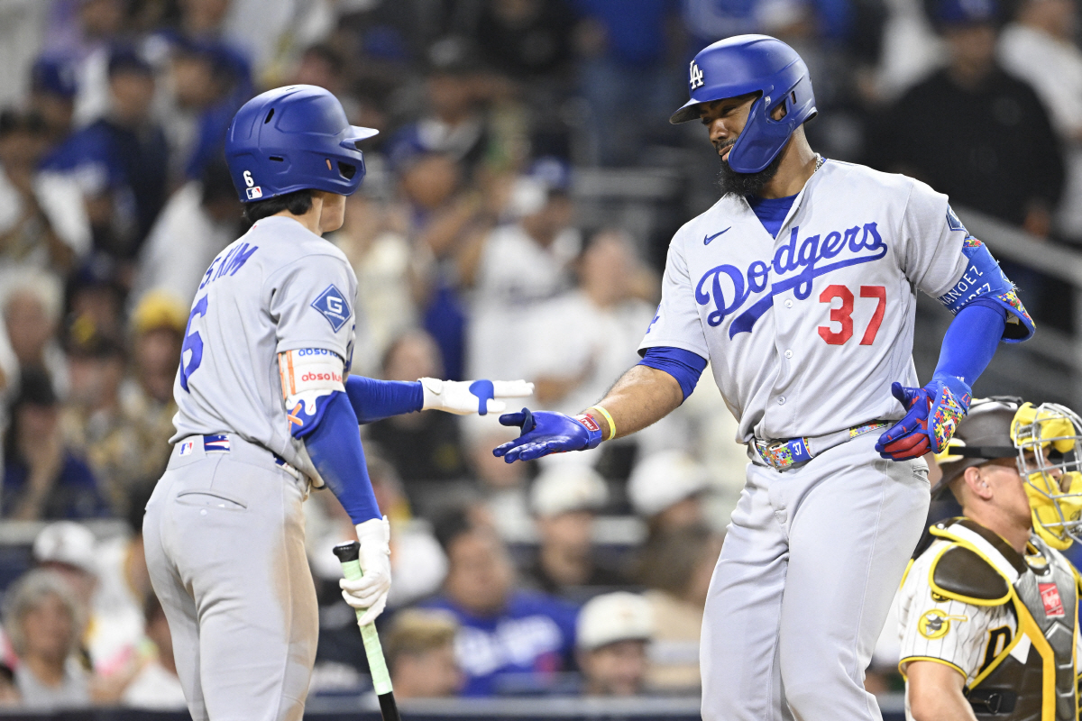 May 20, 2026; San Diego, California, USA; Los Angeles Dodgers left fielder Teoscar Hernandez (37) is congratulated by second baseman Hyeseong Kim (6) after hitting a solo home run during the ninth inning against the San Diego Padres at Petco Park. Mandatory Credit: Denis Poroy-Imagn Images