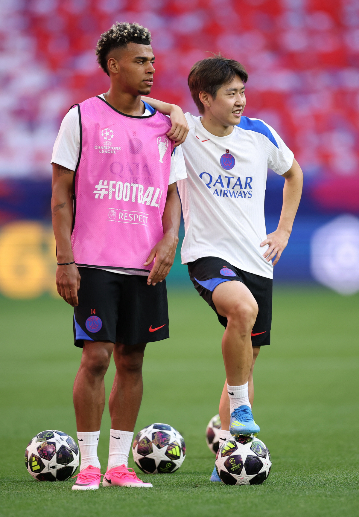 Soccer Football - UEFA Champions League - Final - Paris St Germain Training - Puskas Arena, Budapest, Hungary - May 29, 2026 Paris St Germain's Desire Doue and Lee Kang-in during training REUTERS/Andrew Boyers