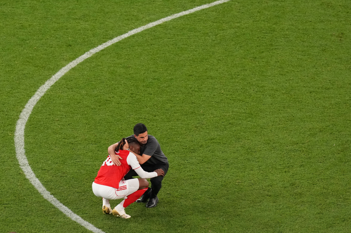 Arsenal's manager Mikel Arteta and Arsenal's Eberechi Eze react during a penalty shootout after extra time during the Champions League final soccer match between Paris Saint-Germain and Arsenal in Budapest, Hungary, Saturday, May 30, 2026.(AP Photo/Vadim Ghirda)