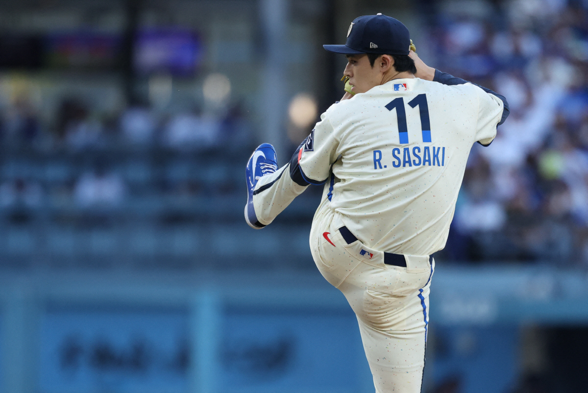 May 30, 2026; Los Angeles, California, USA; Los Angeles Dodgers starting pitcher Roki Sasaki (11) throws against the Philadelphia Phillies during the first inning at Dodger Stadium. Mandatory Credit: Kiyoshi Mio-Imagn Images