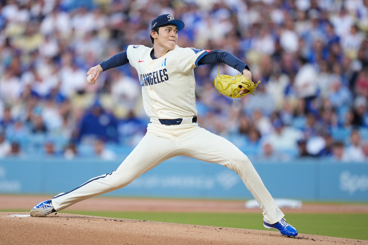 Los Angeles Dodgers starting pitcher Roki Sasaki throws to the plate during the first inning of a baseball game against the Philadelphia Phillies, Saturday, May 30, 2026, in Los Angeles. (AP Photo/Mark J. Terrill)