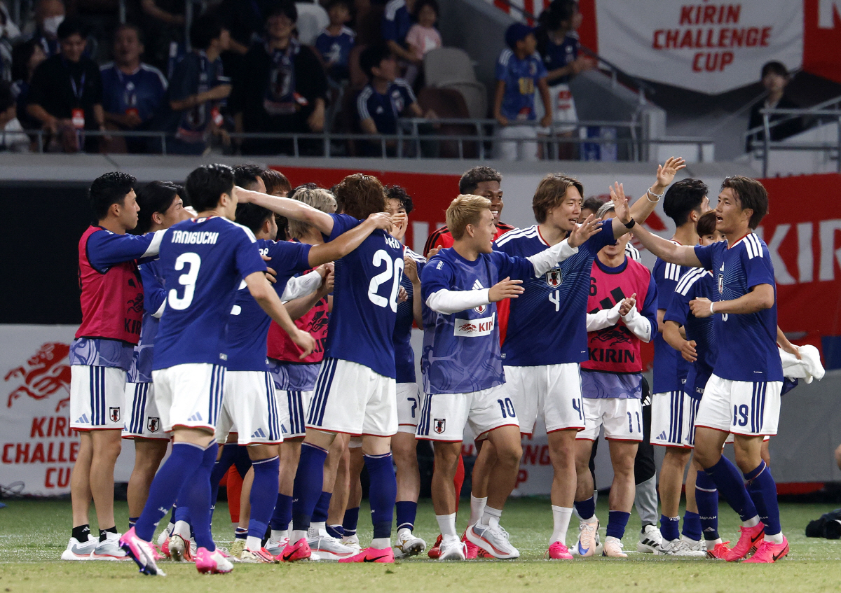 epa13006447 Japan's Koki Ogawa (R) celebrates after scoring against Iceland during the friendly soccer match between Japan and Iceland at the National Stadium in Tokyo, Japan, 31 May 2026. EPA/FRANCK ROBICHON