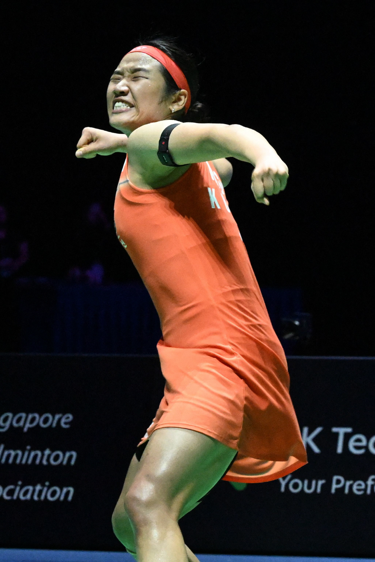 An Se-young of South Korea celebrates victory after defeating Akane Yamaguchi of Japan in the women?s singles final match of the KFF Singapore Open Badminton tournament in Singapore on May 31, 2026. (Photo by Roslan RAHMAN / AFP)