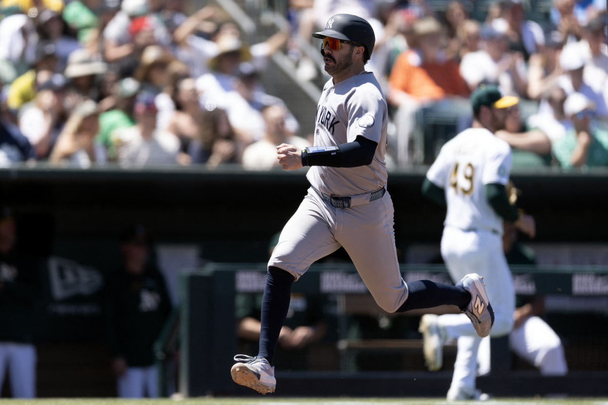 May 31, 2026; West Sacramento, California, USA; New York Yankees catcher Austin Wells (28) scores a run against the Athletics during the third inning at Sutter Health Park. Mandatory Credit: D. Ross Cameron-Imagn Images