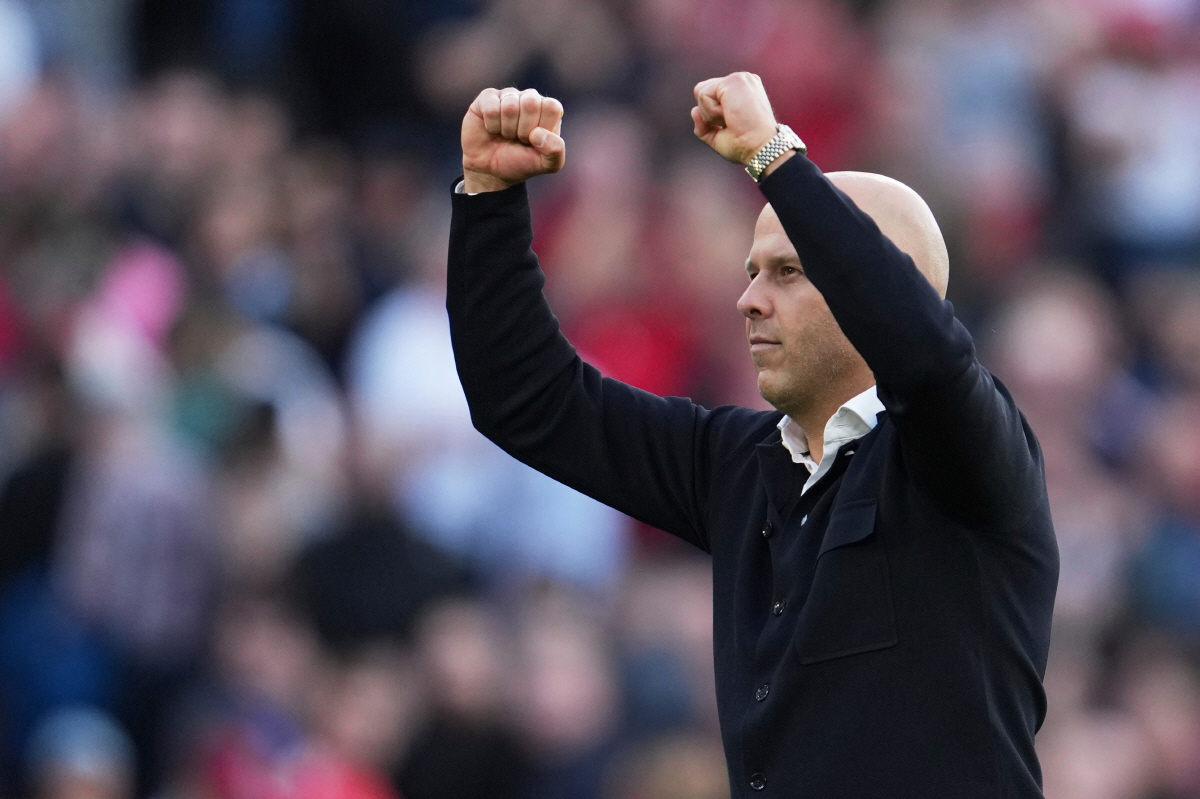 FILE - Liverpool's manager Arne Slot celebrates after the English Premier League soccer match between FC Liverpool and FC Arsenal in Liverpool, England, Sunday, Aug. 31, 2025. (AP Photo/Jon Super, File) FILE PHOTO