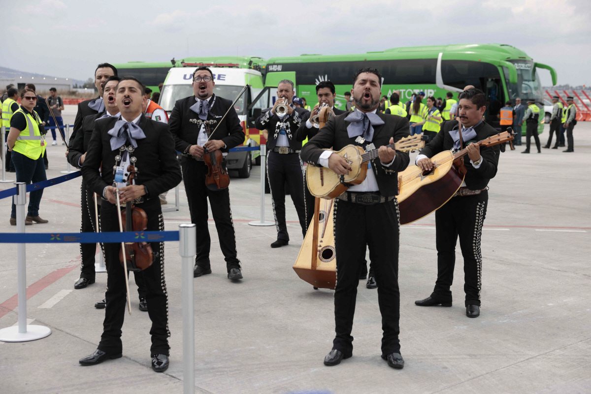 Mariachis perform as Korea Republic's players arrive at the Guadalajara International Airport Miguel Hidalgo on the outskirts of Guadalajara, Mexico on June 5, 2026, ahead of the FIFA 2026 World Cup football tournament. (Photo by Ulises RUIZ / AFP)