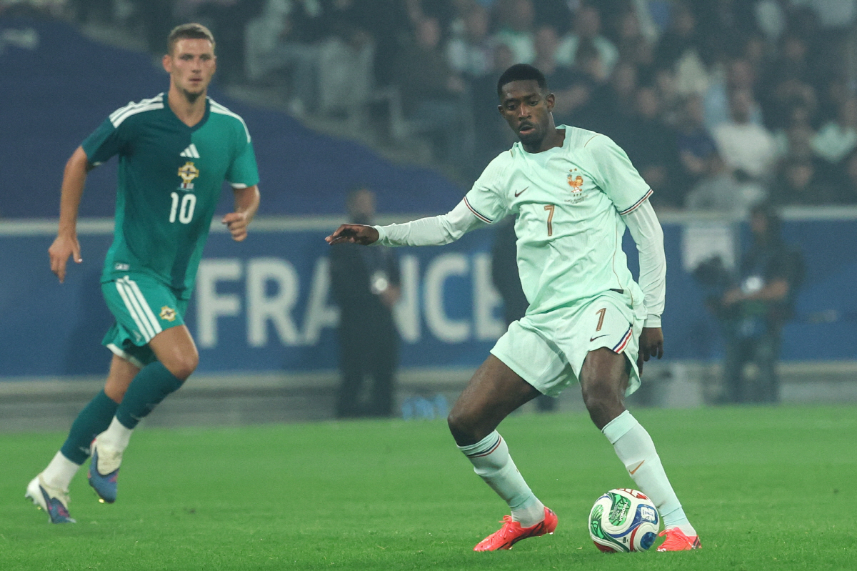 epa13025183 Ousmane Dembele of France (R) in action against Jamie Donley (L) of Northern Ireland during the international friendly soccer match between France and Northern Ireland in Lille, France, 08 June 2026. EPA/MOHAMMED BADRA