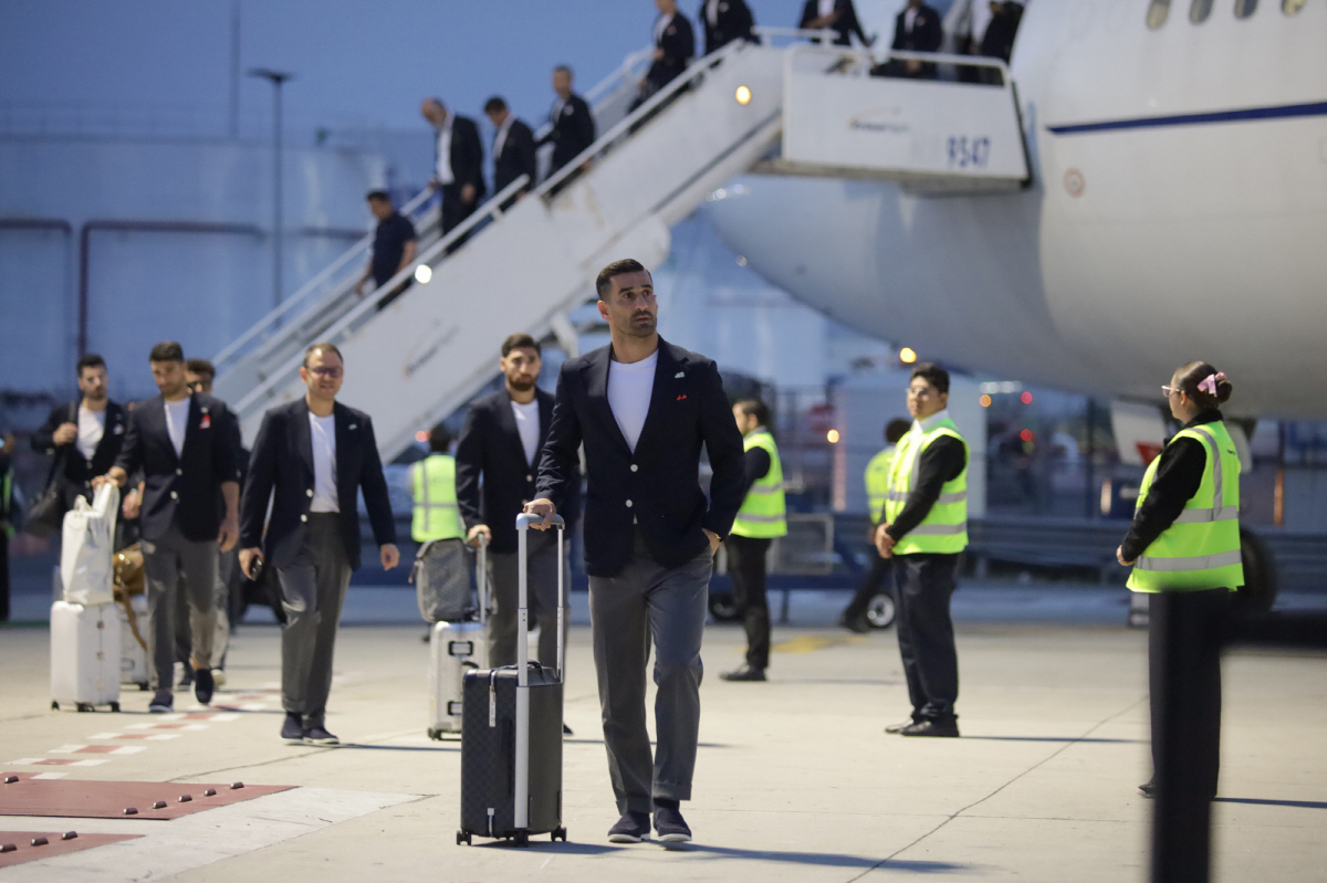 epa13023182 Players from the Iranian national soccer team arrive at the Tijuana International Airport, near Tijuana, Mexico, 07 June 2026. The Iranian team will set up its base of operations ahead of their FIFA 2026 World Cup matches to be held in the United States. EPA/JOEBETH TERRIQUEZ