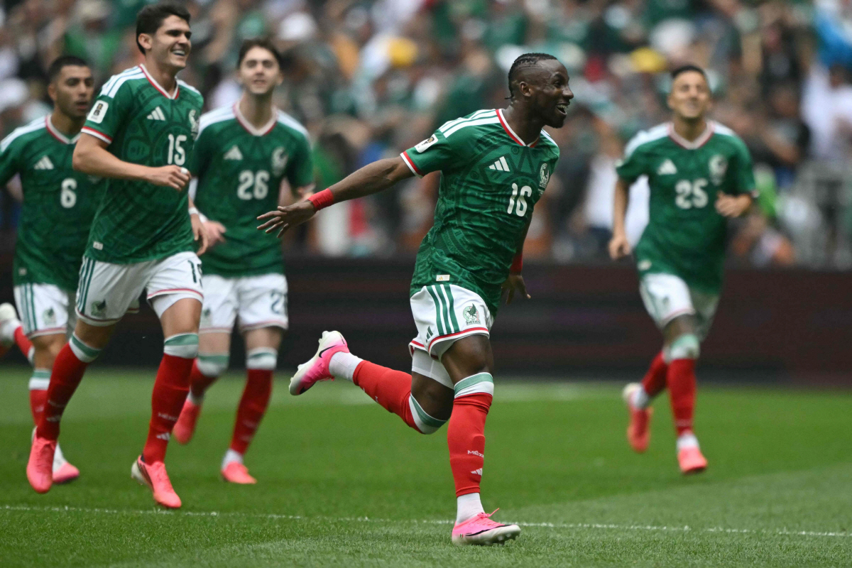 TOPSHOT - Mexico's forward #16 Julian Quinones celebrates scoring his team's first goal during the 2026 World Cup Group A football match between Mexico and South Africa at the Mexico City Stadium in Mexico City on June 11, 2026. (Photo by CARL DE SOUZA / AFP)