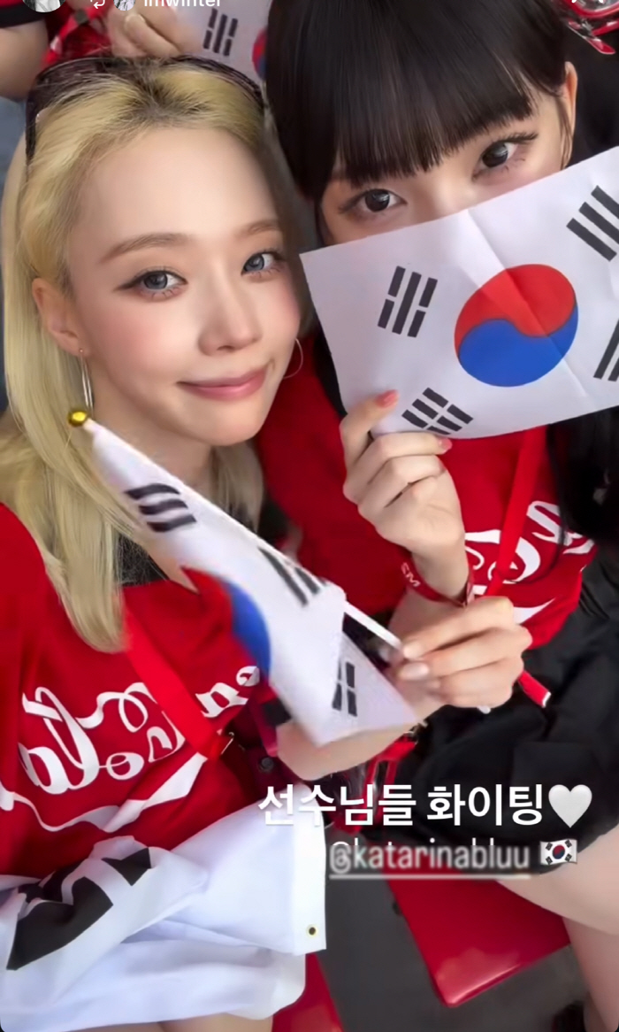 Karina and Winter, Mexico’s Stunning 'Red Devils'... Waving the Flag of South Korea and Cheering, 'Go, Republic of Korea!'