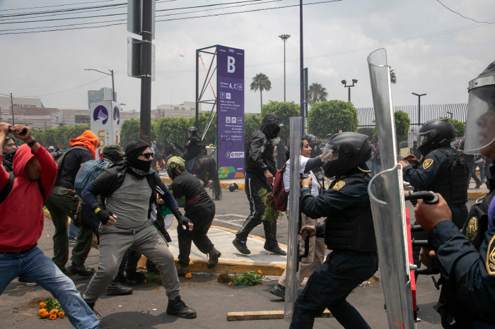 World Cup Opening Match Protesters Clash with Police in Mexico — Is the Right to Protest Being Respected?