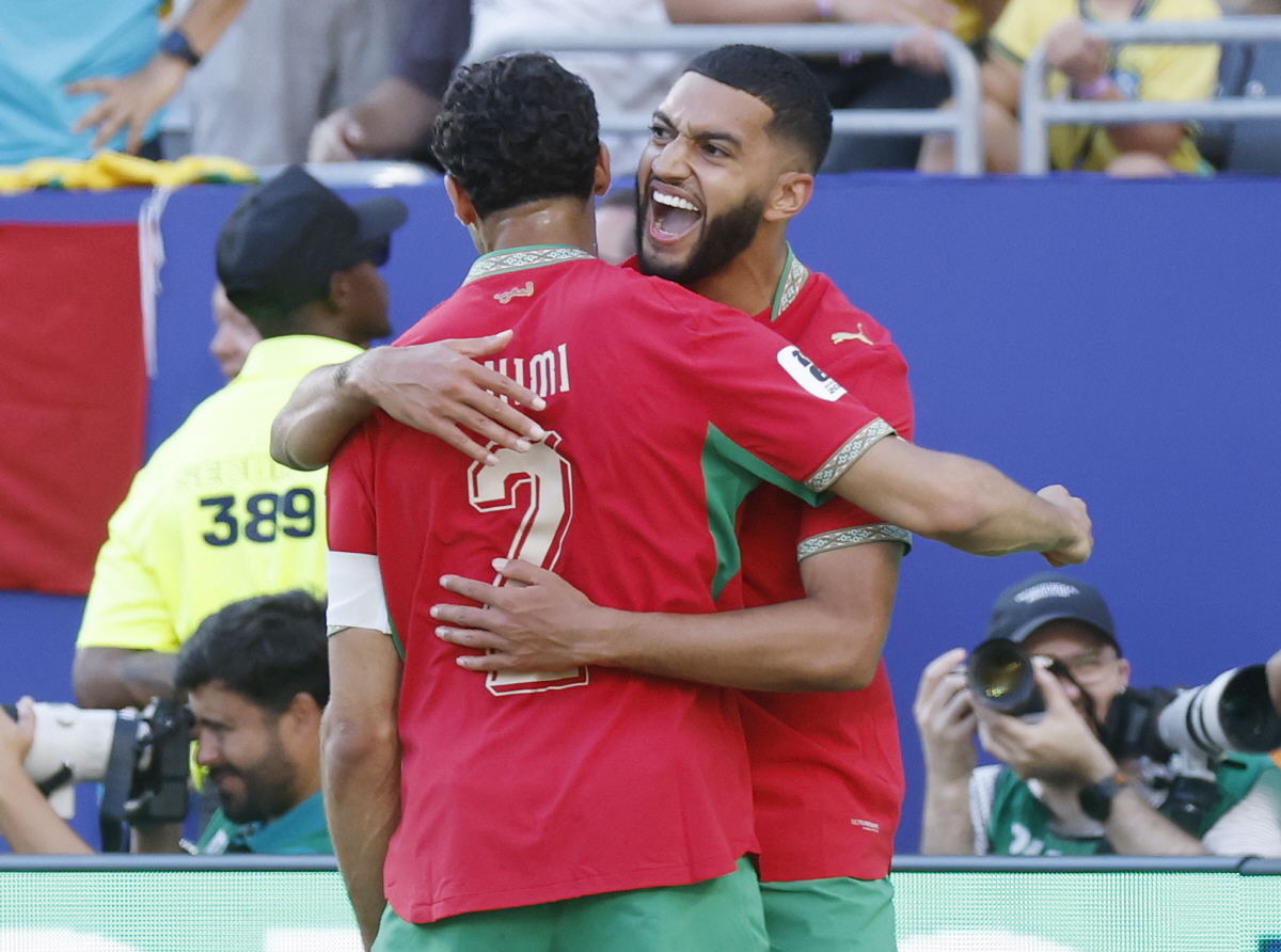 Morocco's Ismael Saibari celebrates with teammate Achraf Hakimi (2) after scoring against Brazil in the first half of a FIFA World Cup match at MetLife Stadium in East Rutherford, New Jersey, on Saturday, June 13, 2026. Photo by John Angelillo/UPI